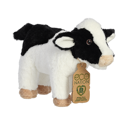 Black and white plush cow with a cream muzzle and an Eco Nation hang tag, on a transparent background.