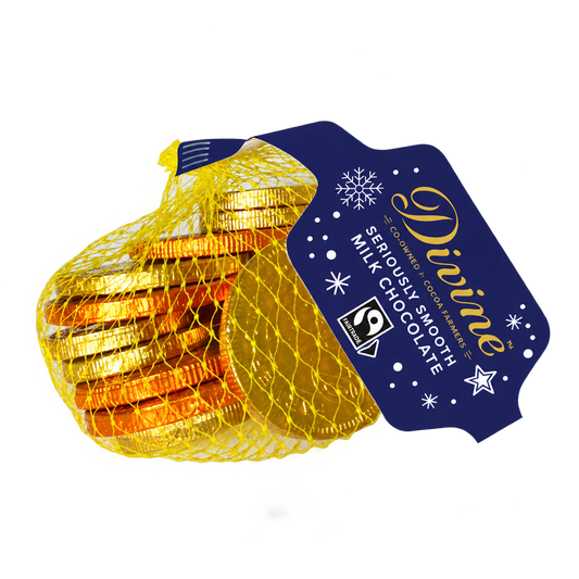 Divine milk chocolate coins wrapped in gold foil in a yellow net bag with a purple Divine label, on a transparent background.